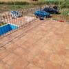 House with tiled terrace overlooking parking area in Riba-roja d’Ebre Tarragona.