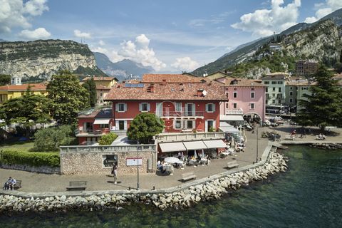 Lake view duplex and three-room apartment with balcony overlooking Torbole harbor in historic "Casa Beust" 1 12 4607779 1380794140780809264