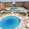 View of the pool area at Royal Sun resort in Sunny Beach, Bulgaria, with surrounding apartments and.