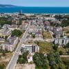 Aerial view of Sunny Beach showing modern apartments close to the beach and scenic coastline.