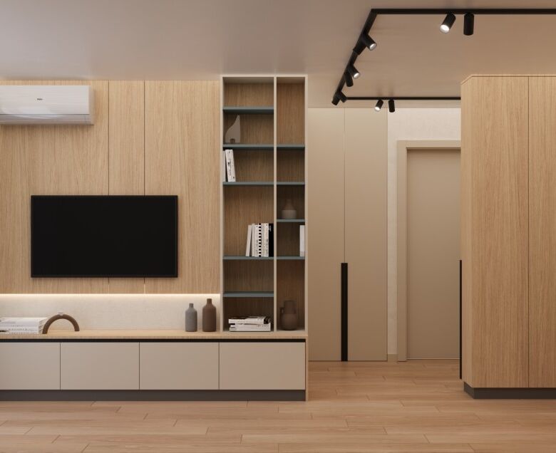 Stylish living room featuring a wall-mounted TV, open shelving, and contemporary decor in a sleek, m.
