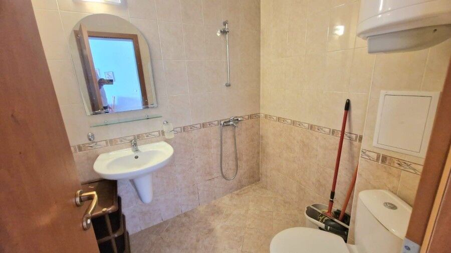 Bathroom with shower, sink, and toilet in Sunny Day 3, Sunny Beach, Bulgaria.