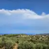 Beautiful land plot for sale in Raches Kyparissia with scenic views and lush greenery.