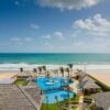 Luxury 3-bedroom villa with ocean views at Coral Beach Resort Flecheiras. Perfect for seaside living.