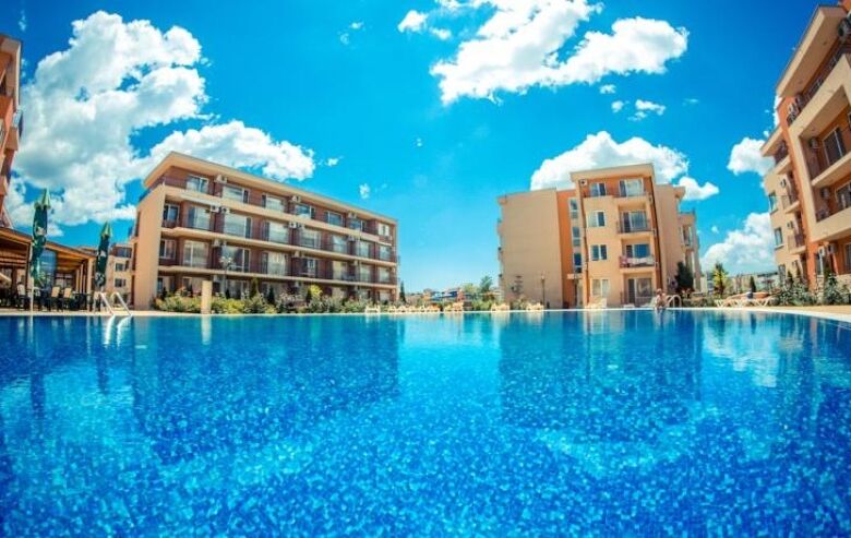 Pool view of Sunny studio with garden views in Holiday Fort Club, Sunny Beach, Bulgaria.