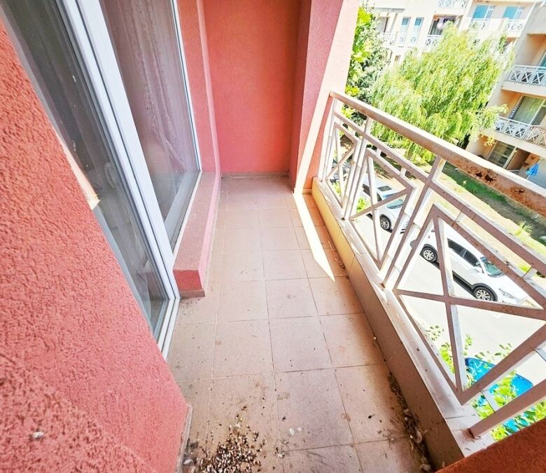 Balcony of a 1-bedroom apartment in Sunny Day 6, Sunny Beach, offering outdoor space and scenic surr.