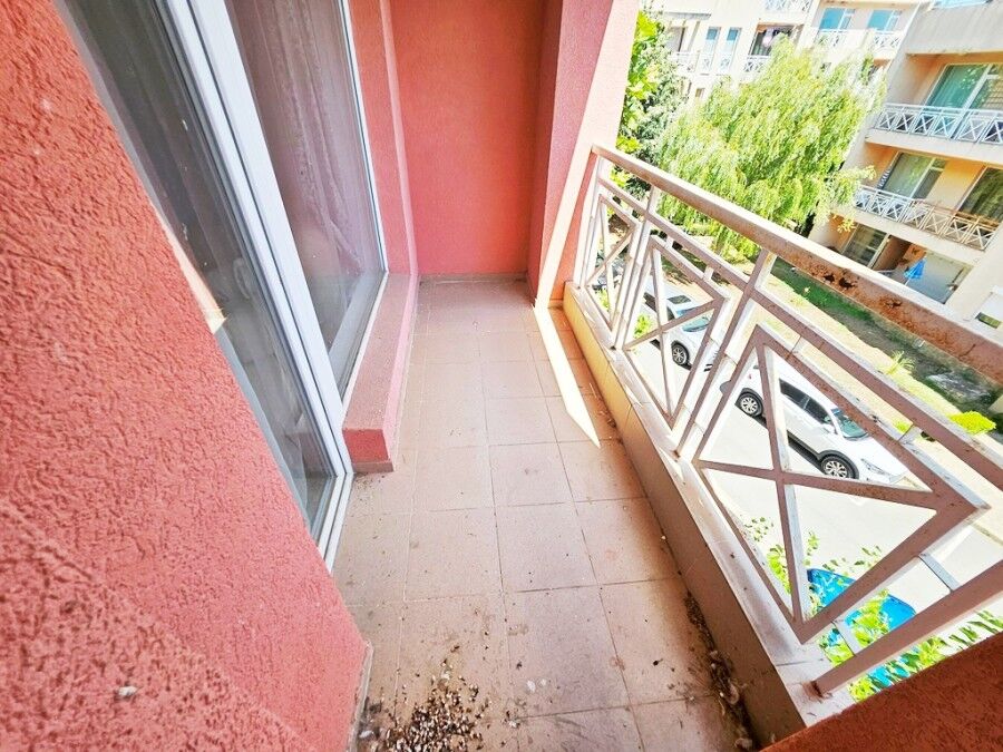 Balcony of a 1-bedroom apartment in Sunny Day 6, Sunny Beach, offering outdoor space and scenic surr.