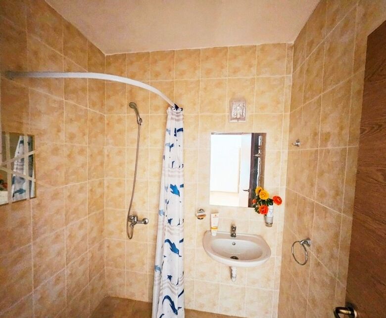 Bathroom with shower, sink, and mirror in Sunny Day 6, Sunny Beach.