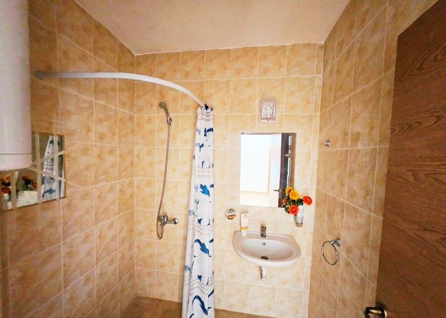 Bathroom with shower, sink, and mirror in Sunny Day 6, Sunny Beach.