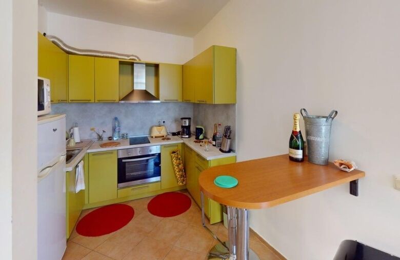 Bright, modern 2-bedroom apartment with open kitchen in Sunny Beach's central area.