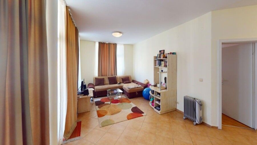 Bright living room with modern furniture and large windows in Barco del Sol.