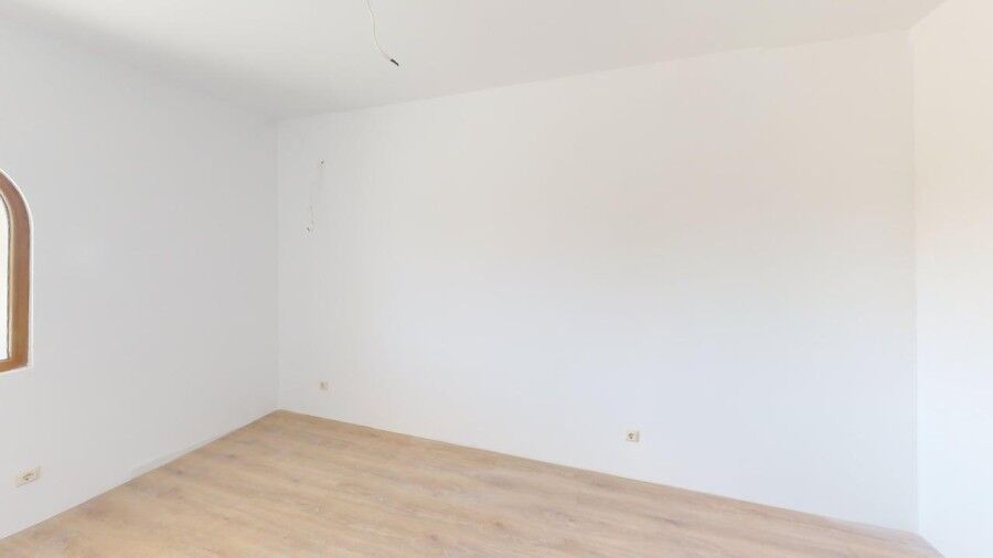 Bright interior of a 1-bedroom ground floor apartment in Grand Village, close to the sea.