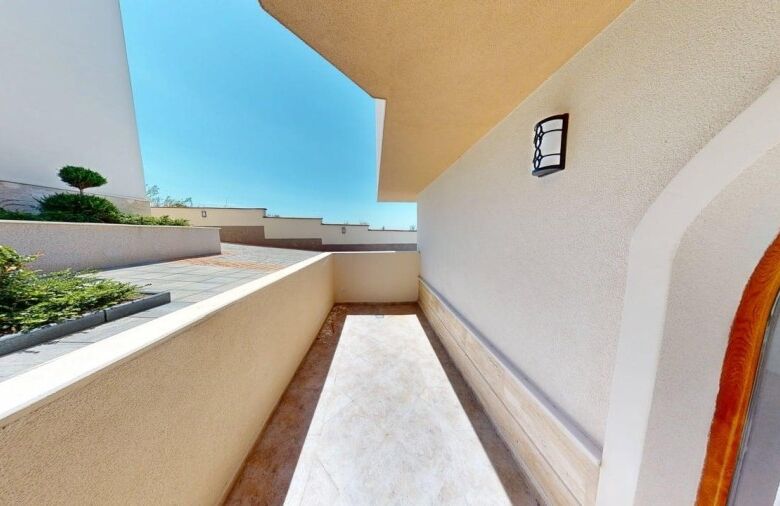 Balcony of a 1-bedroom ground floor apartment in Grand Village, 58 sq.m., located 2 km from the sea.