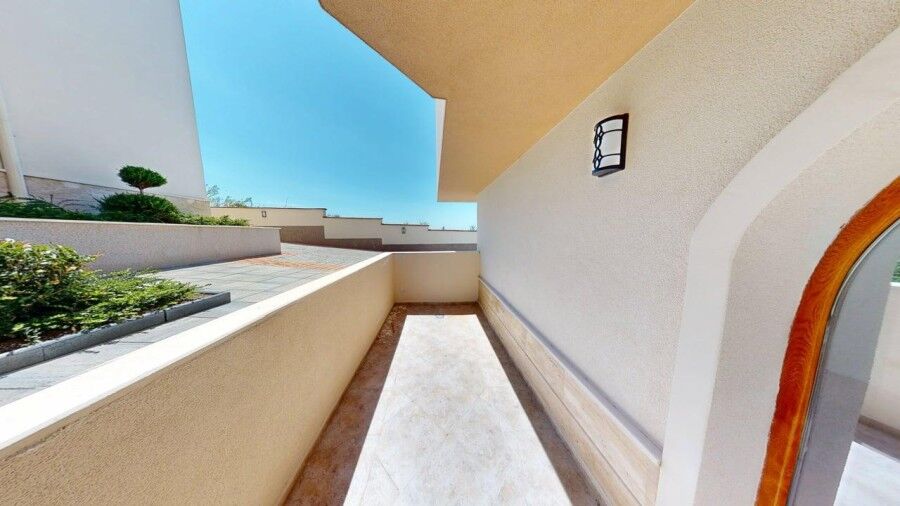 Balcony of a 1-bedroom ground floor apartment in Grand Village, 58 sq.m., located 2 km from the sea.