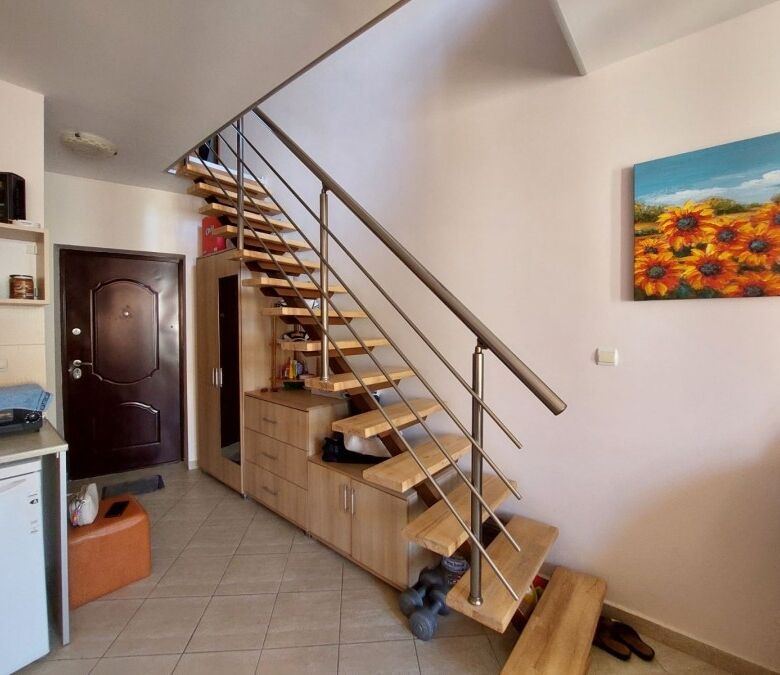Bright interior of a 76 sq.m. maisonette in Amber Beach, Sunny Beach resort. Modern furnishings and.