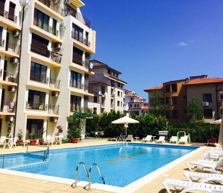 Modern apartment complex with swimming pool in Sunny Beach.