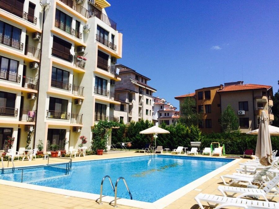 Modern apartment complex with swimming pool in Sunny Beach. Modern apartment complex with swimming pool in Sunny Beach.