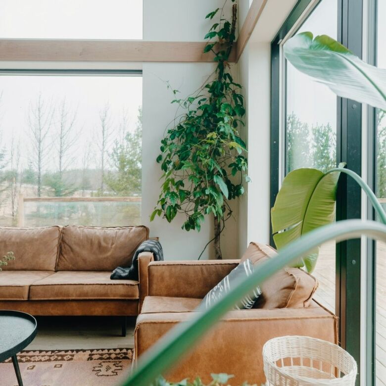 Geothermal designer villa with modern decor in Reykjavik, Iceland, featuring large windows and natur.