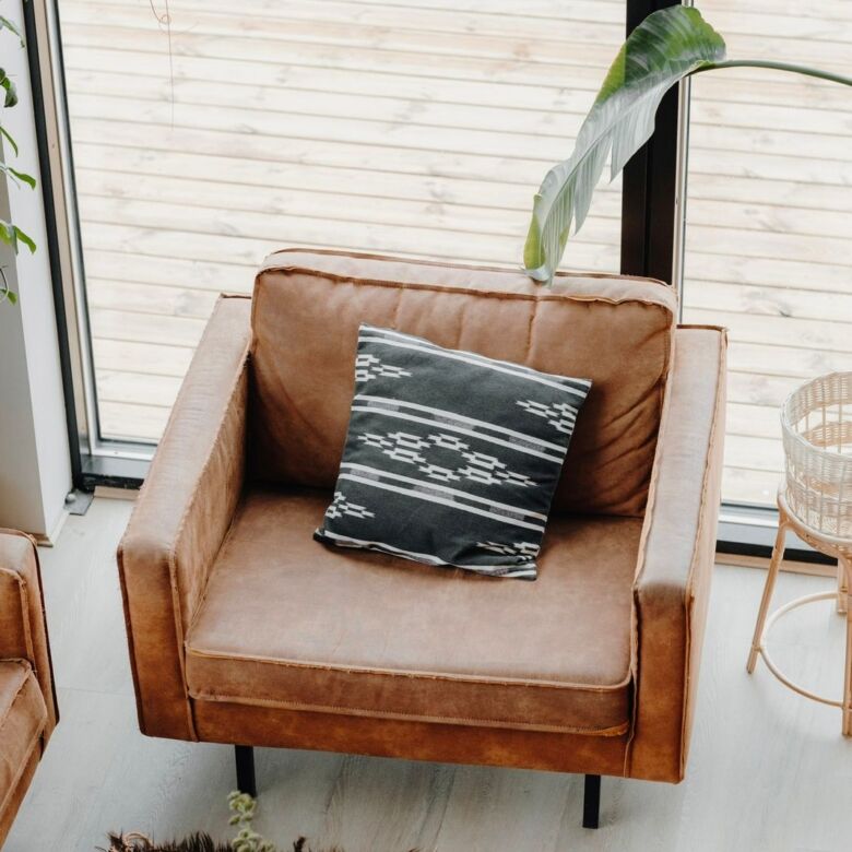 Geothermal designer villa living room in Reykjavik with modern decor and natural light.