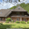 Elegant 5-bedroom house for sale in Kaltenborn-Herschbach, surrounded by lush greenery and scenic mo.