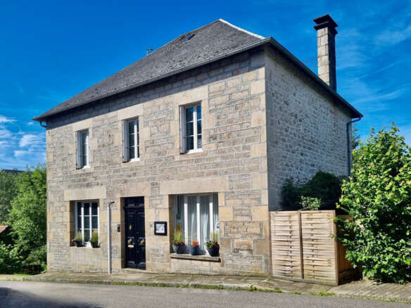 Beautiful stone mansion for sale in Bugeat, featuring classic architecture and spacious interiors. P.