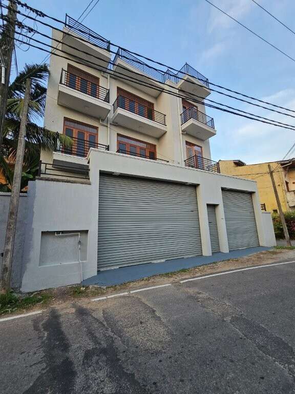 Modern 12-bedroom condo building for sale in Colombo, Sri Lanka. Prime location with spacious balcon.