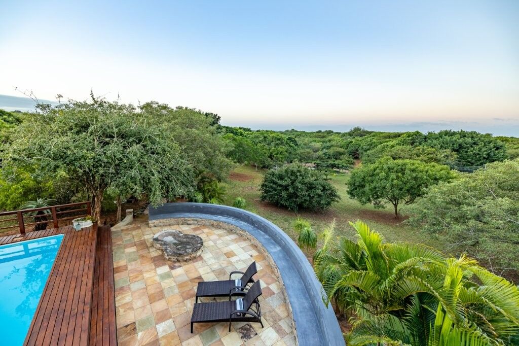 Luxury estate featuring a private pool and lush greenery in Hluhluwe Kwa-Zulu Natal South.