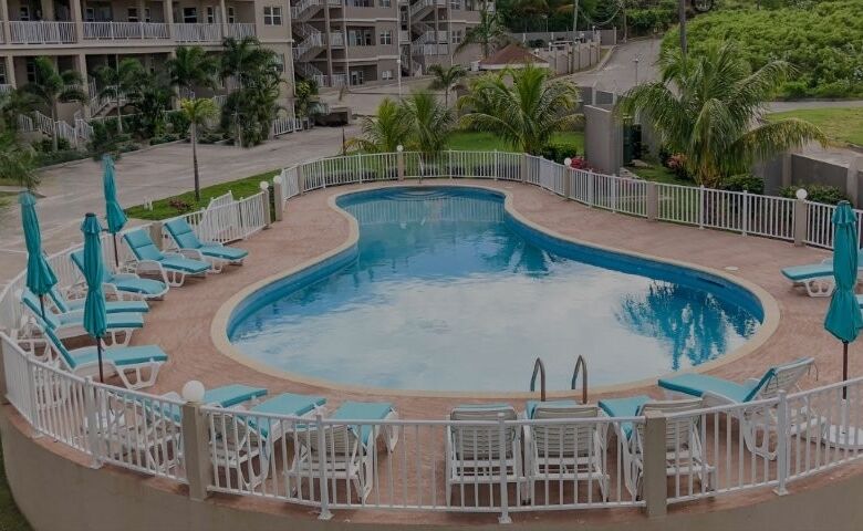 Pool area at Imperial Bay Residences, a luxurious villa community for sale.