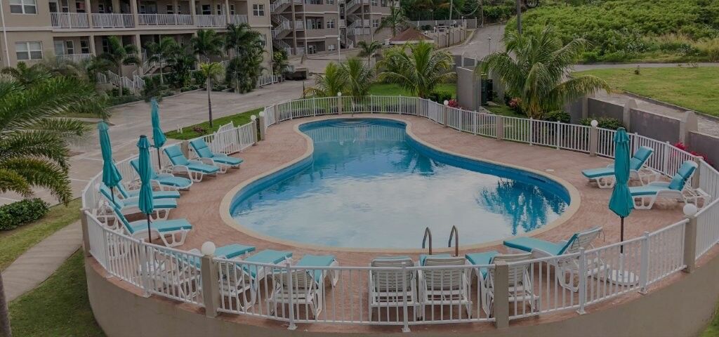Pool area at Imperial Bay Residences, a luxurious villa community for sale.