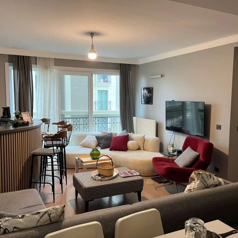 Spacious 2-bedroom apartment in Istanbul with contemporary decor, balcony, and city views, ideal for.
