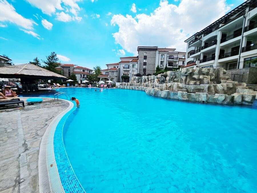 Pool view apartment at Vineyards SPA Resort, 45 sq.m., with access to luxurious amenities.