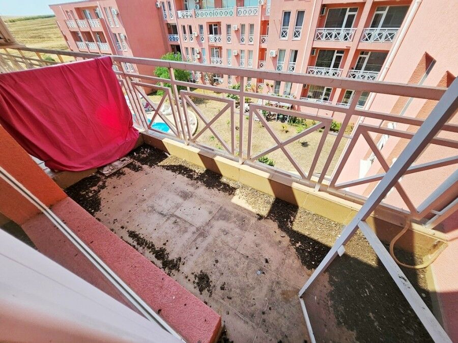 Top floor studio balcony with pool view in Sunny Day 6, Sunny Beach.