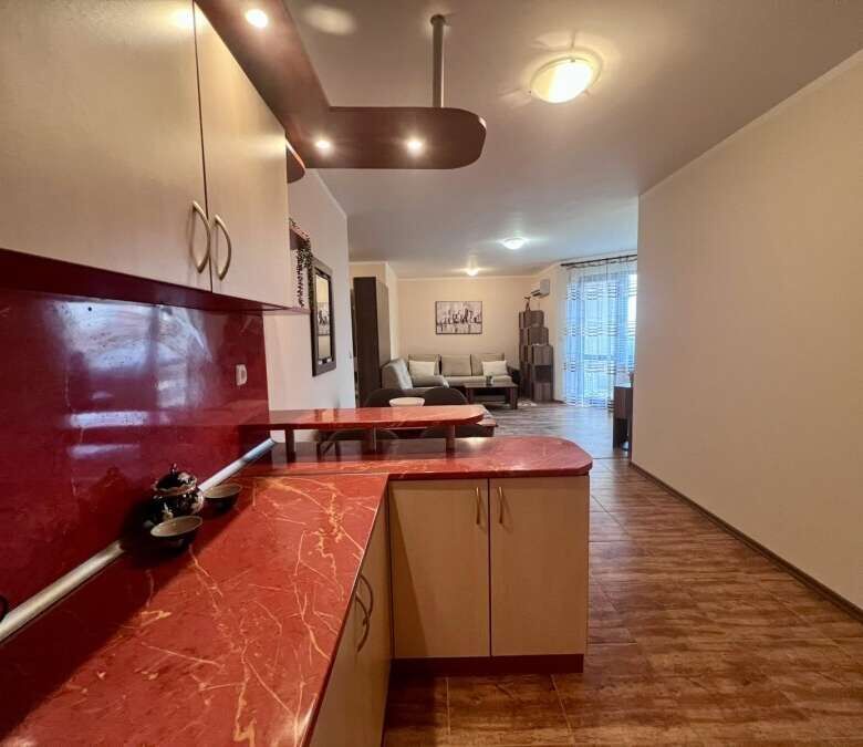 Spacious 60 sq.m. studio featuring pool views, modern interior, and open-plan living space in St. Ni.