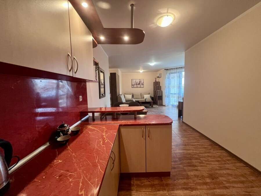 Spacious 60 sq.m. studio featuring pool views, modern interior, and open-plan living space in St. Ni.
