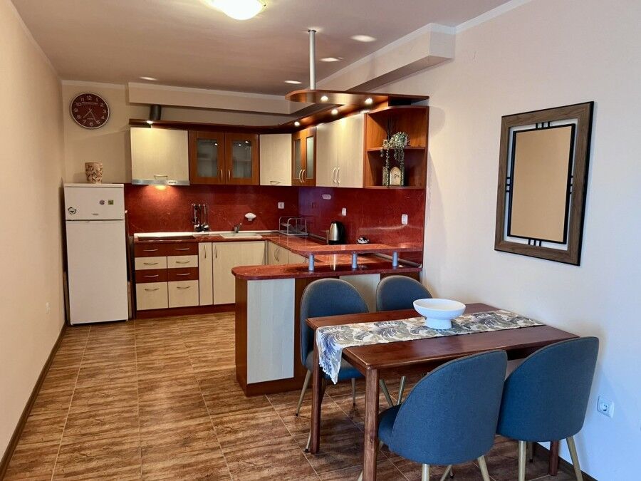 Spacious 60 sq.m. studio featuring pool views, modern kitchen, and comfortable dining area in St. Ni.