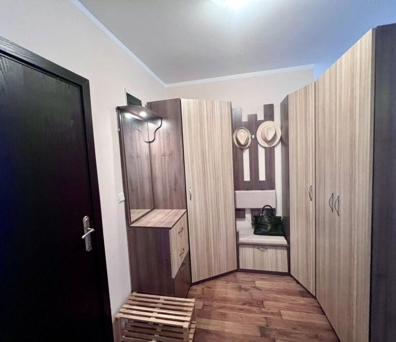 Interior view of a spacious studio apartment with pool views in St. Nicola, Kosharitsa.