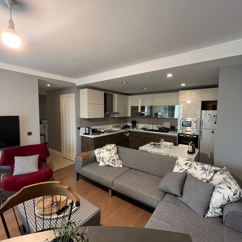 Spacious 2-bedroom apartment in Istanbul with contemporary design and open-plan living area. Perfect.