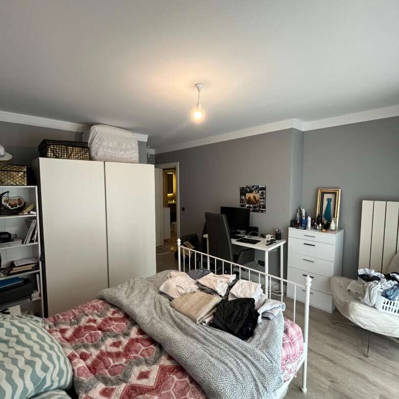 Bright and spacious 2-bedroom apartment in Istanbul with modern furnishings and ample storage.