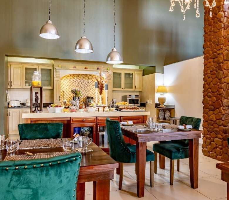 Elegant interior of a luxury estate with modern kitchen and dining area in Hluhluwe Kwa-Zulu Natal S.