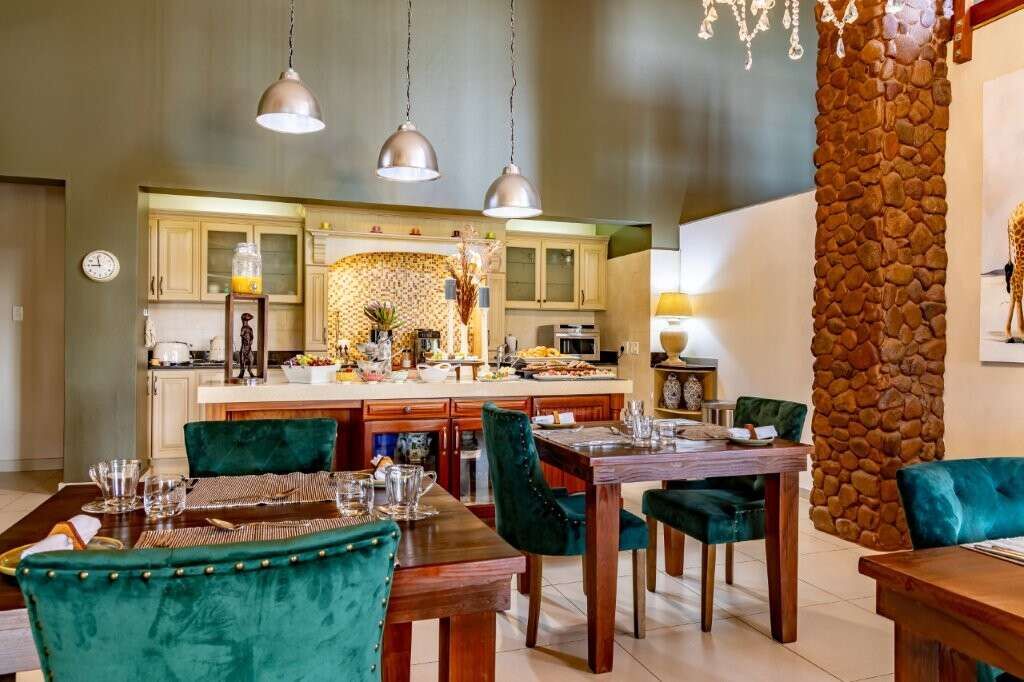 Elegant interior of a luxury estate with modern kitchen and dining area in Hluhluwe Kwa-Zulu Natal S.