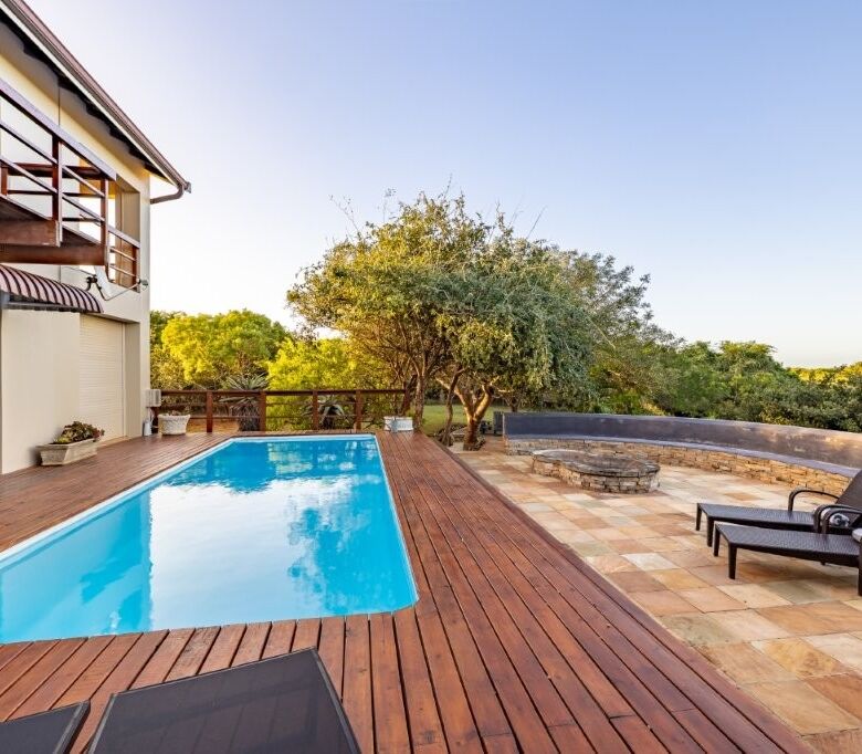 Elegant estate featuring two luxurious homes with private pool and scenic views in Hluhluwe Kwa-Zulu.