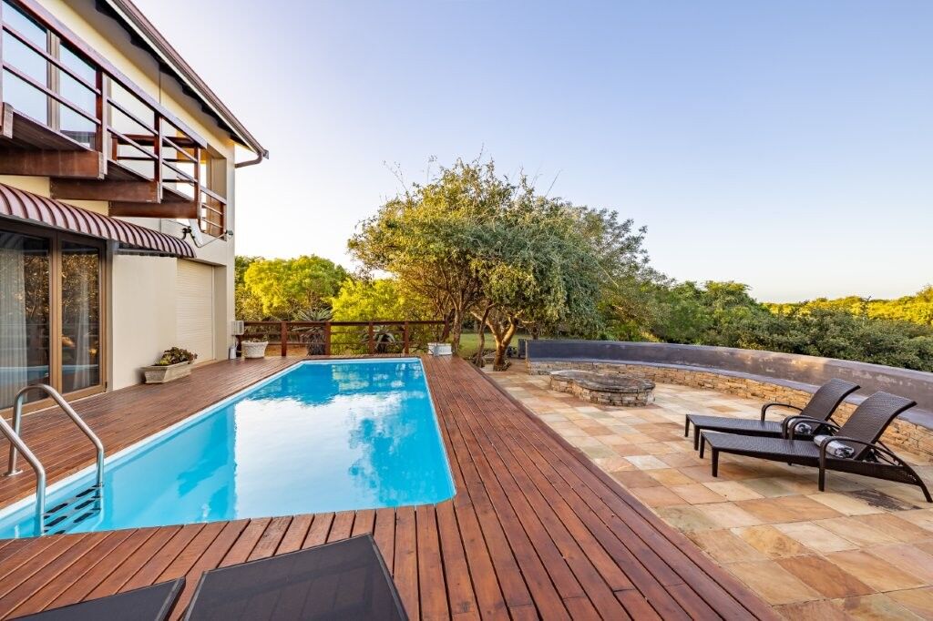 Elegant estate featuring two luxurious homes with private pool and scenic views in Hluhluwe Kwa-Zulu.