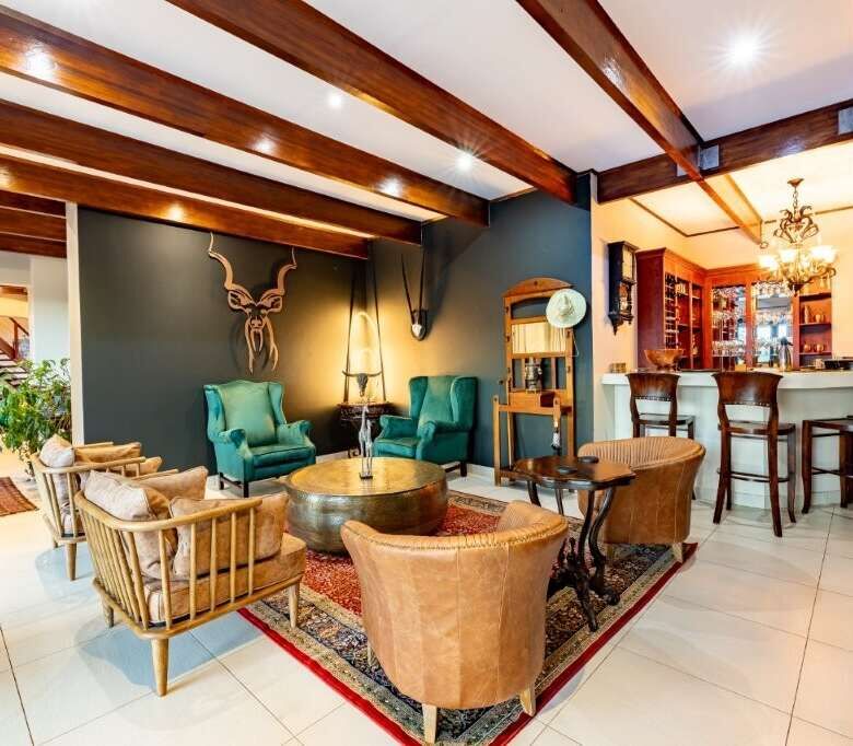 Elegant interior of a luxury estate with stylish furniture and warm lighting in Hluhluwe Kwa-Zulu Na.