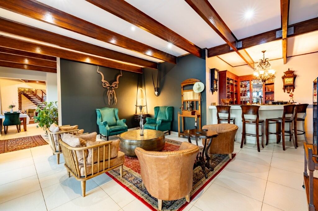 Elegant interior of a luxury estate with stylish furniture and warm lighting in Hluhluwe Kwa-Zulu Na.