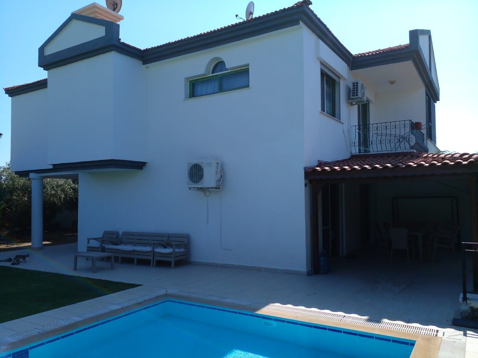 Villa with private pool in Cesme, Turkey, offering modern amenities and stunning sea views. Perfect.