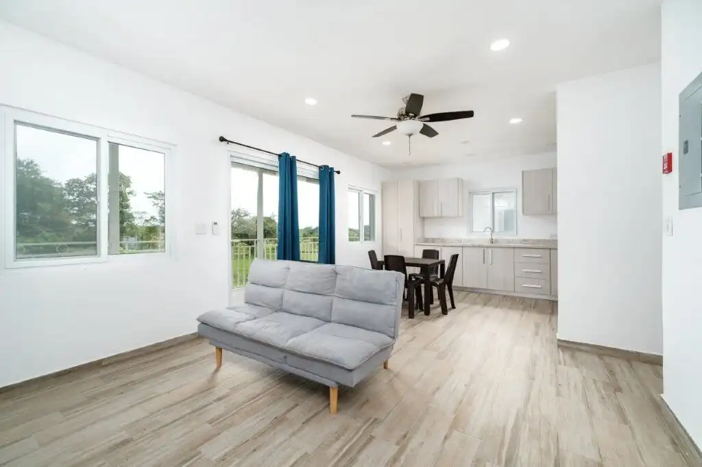 Bright living room with ocean views in Pedasi condo resort.