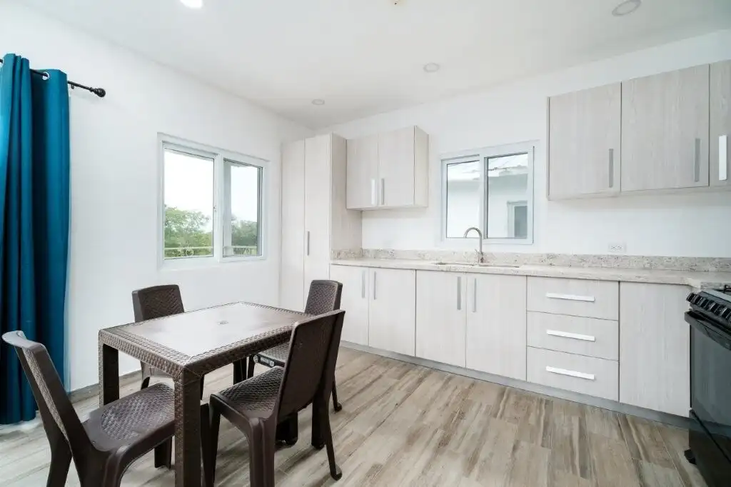 Ocean Waves Condo Kitchen with bright white cabinets in Pedasi, Panama.