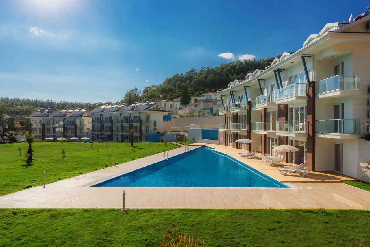 Modern 2-bedroom apartment with pool in Ovacık, perfect for comfortable living and investment.