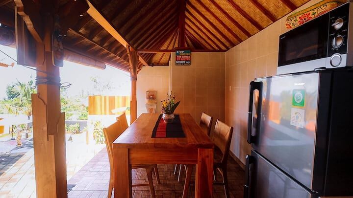 Elegant hilltop retreat with modern kitchen and spacious dining area in Nusa Lembongan Bali.