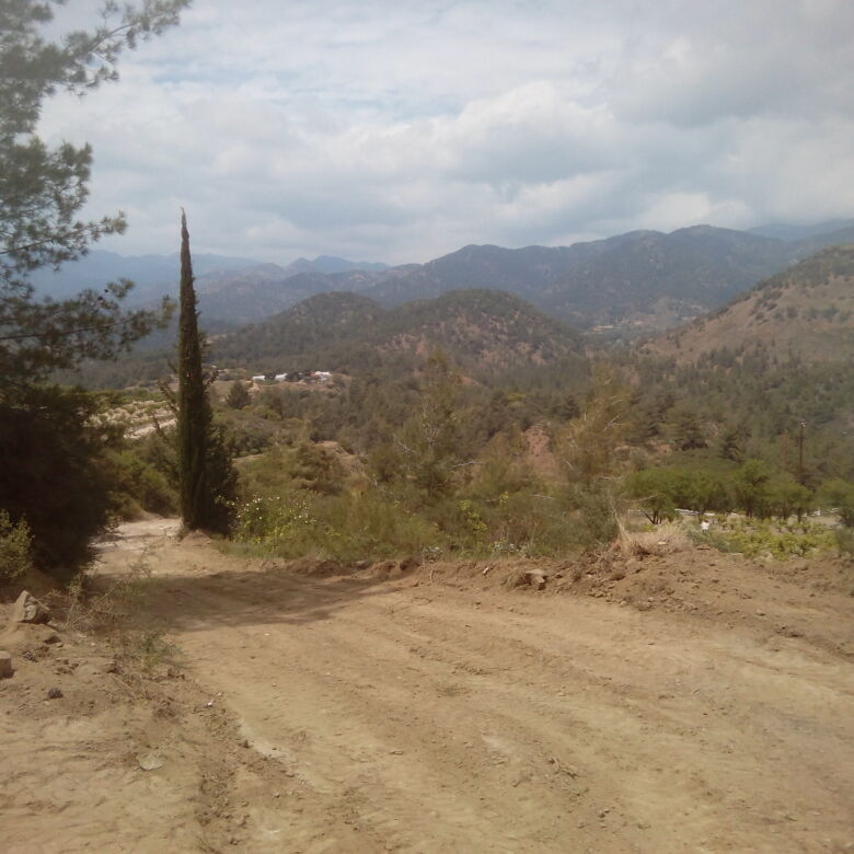 Land for sale near Paphos and Nicosia with scenic mountain views and rural surroundings. Ideal for b.